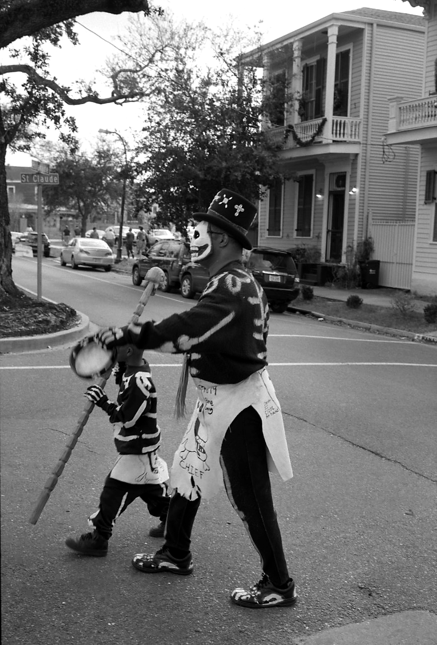 a man and a child in carnival clothing